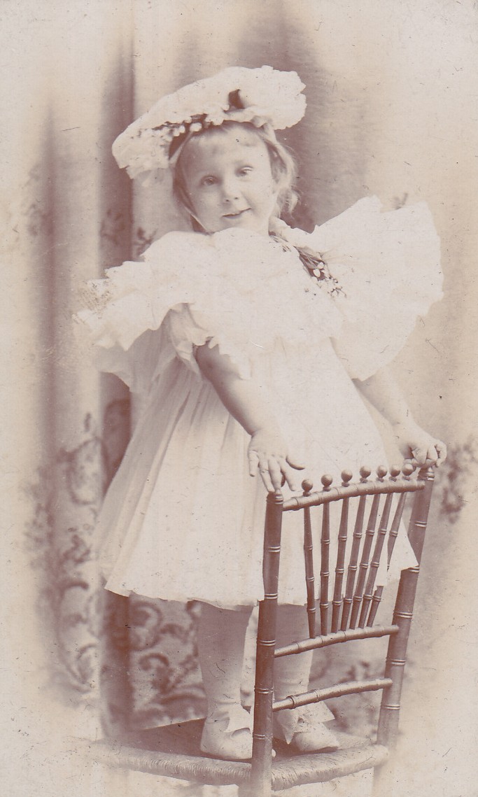 Mildred-young-standing-on-chair